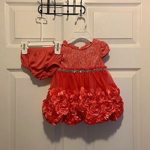 Girls dress 6/9 months. Coral color